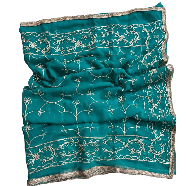 Shop turquoise blue georgette embroidery saree with unstitched blouse. Lightweight, stylish & perfect for weddings, parties and festivals.